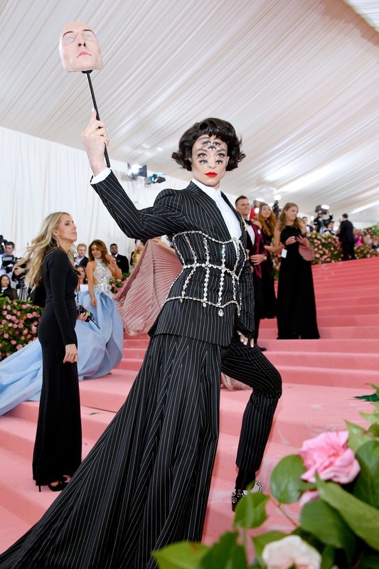 Ezra Miller in Burberry wearing Tiffany &amp; Co. jewelry